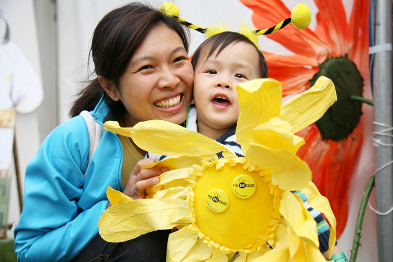 Visitors at the Hampton Court Palace Flower Show join the Bee Cause and call on the Government <br />to help save bees by introducing a National Bee Action Plan. Photo for Friends of the Earth UK. <br />UNITED KINGDOM, London | 2012
