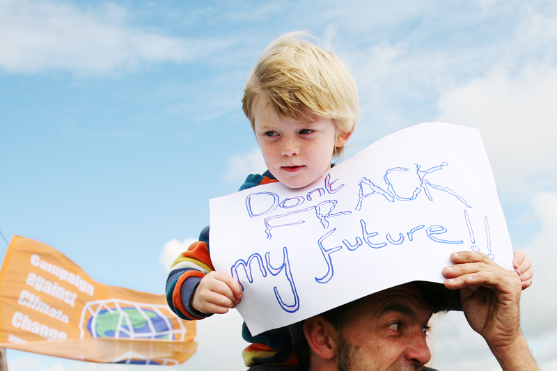 A young Lancashire resident joins climate campaigners on Camp Frack march to oppose<br /> Britain's first hydraulic fracturing shale gas well, with the message "Don't frack my future!"<br />UNITED KINGDOM, Southport | 2011
